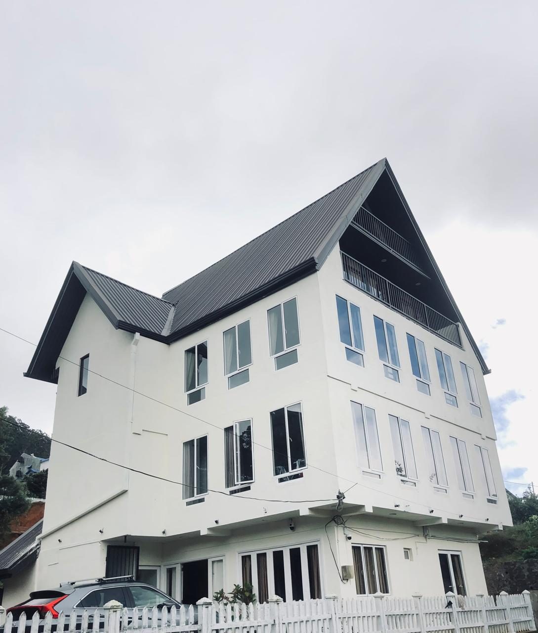 House under cloudy sky