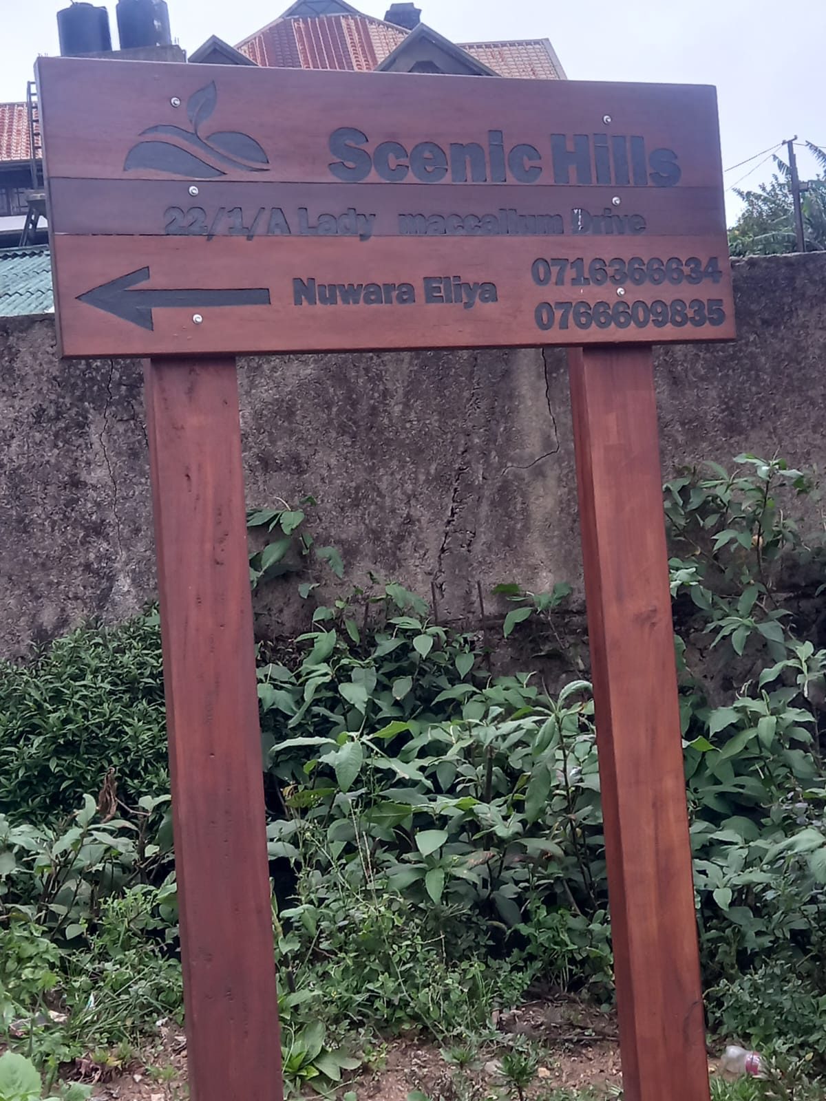 Scenic Hills signboard on the road
